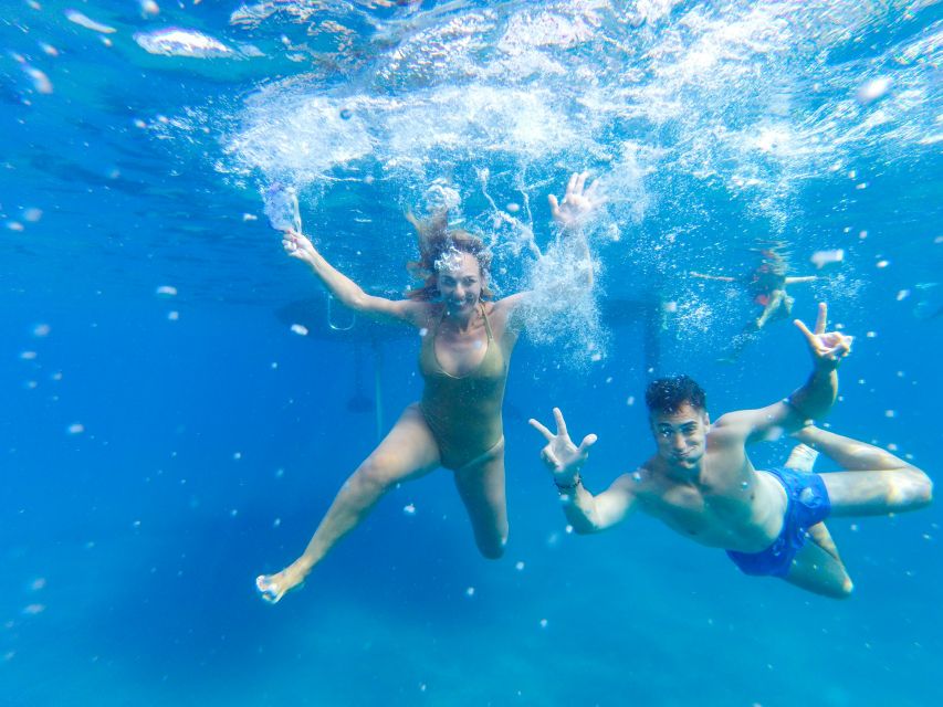 Fuerteventura: Sailing with Snorkeling and Dolphin Watching - How dolphins and whales get spotted: listening, repositioning, then waiting