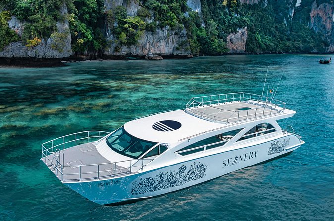 Full-Day Phi Phi and Maiton islands Tour by Speed Catamaran - Pileh Lagoon by longtail boat: limestone cliffs up close