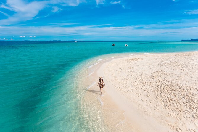 Full-Day Phi Phi and Maiton islands Tour by Speed Catamaran - Stop 1: Bamboo Island for easy snorkeling and sun time