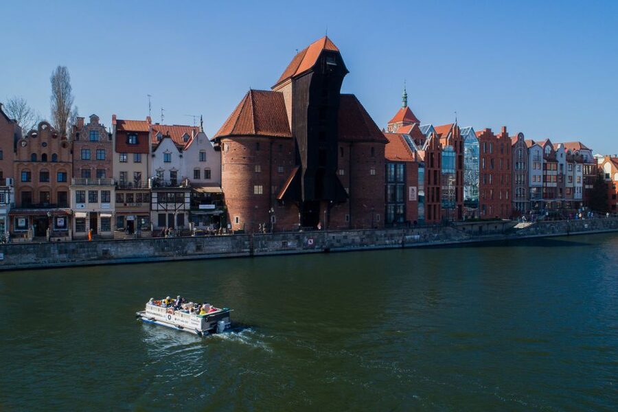 Gdańsk: Motlawa River Sightseeing Catamaran Cruise - Polish Hook cape, shipyards, and industrial cranes: the city’s working side