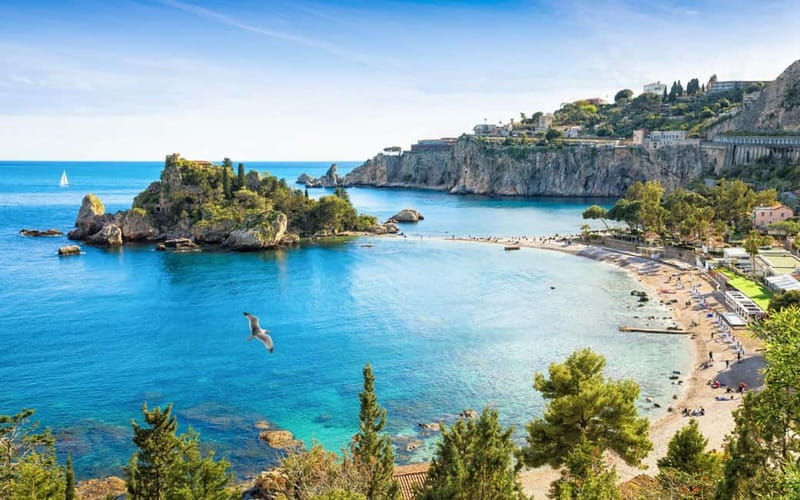 Giardini Naxos: Dolphin Catamaran Sunset Tour with Aperetif - Isola Bella, swim time, and cave areas you can actually enjoy