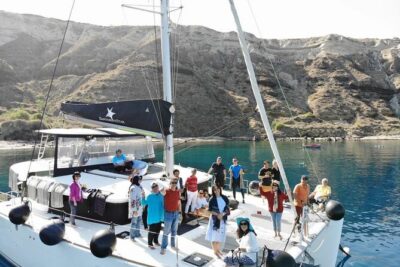 Half-Day Exclusive Catamaran Cruise in Santorini with Meal and Open Bar - Volcano Hot Springs: Warm Water, Quick Swim, and Warm Views