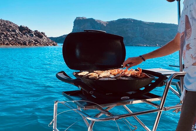 Half-Day Exclusive Catamaran Cruise in Santorini with Meal and Open Bar - The Sights You Get Without the Crowds: Fira’s Old Port and More
