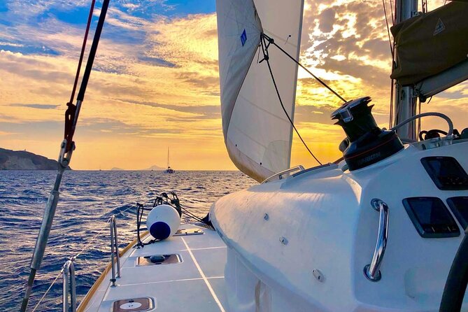 Half Day Premium Catamaran Cruise in Santorini including Oia - Crew and onboard vibe: small group comfort, with shared-time reality