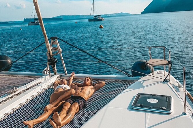 Half Day Premium Catamaran Cruise in Santorini including Oia - BBQ dinner and open bar: what to expect, and how to enjoy it