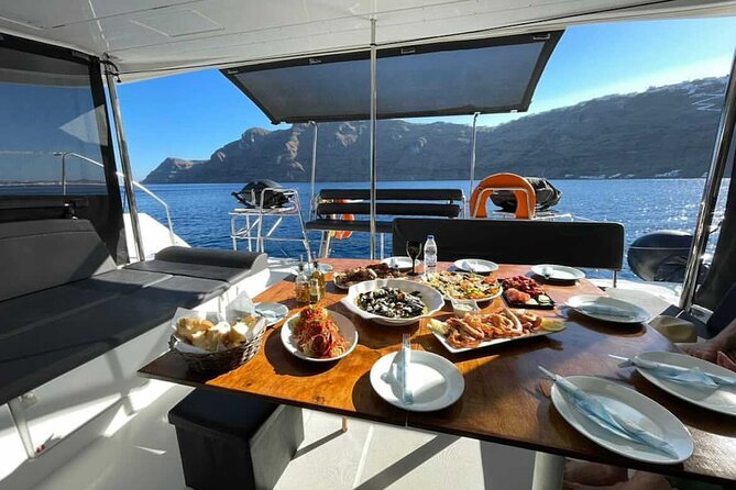 Half Day Premium Catamaran Cruise in Santorini including Oia - The limestone-and-crystal-water break that fills the middle of the day