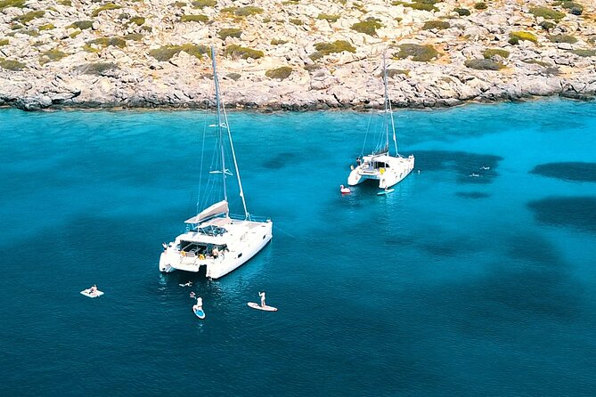 Heraklion: Catamaran Cruise to Dia with Sunset, Meal & Bar - Welcome drinks and open-bar value: what $132 buys you