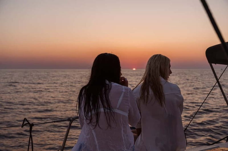 Heraklion: Sunset Sailing Cruise Dia Island with Snorkeling - Paddleboarding: a fun add-on when the water cooperates