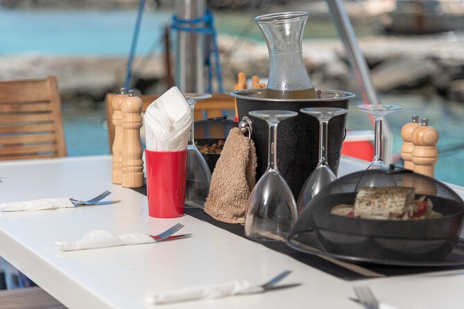 Hersonissos: Luxury Sunset Catamaran Cruise Sushi & Open Bar - Welcome Prosecco, sushi rolls, and light snacks that actually cover the basics