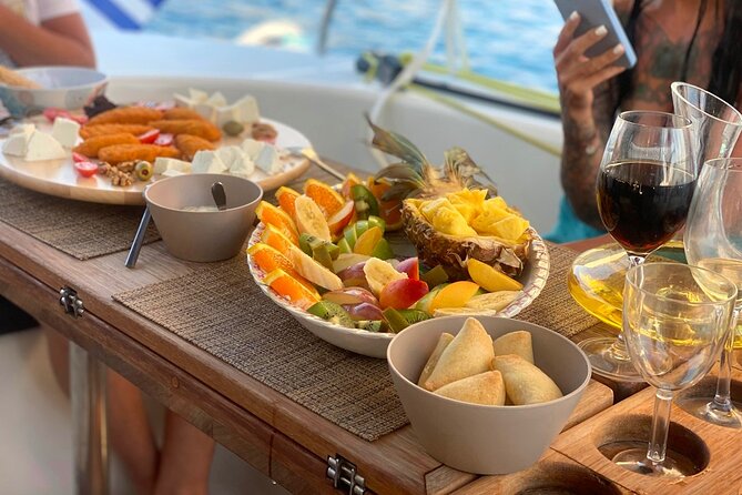Hersonissos: Luxury Sunset Catamaran Cruise Sushi & Open Bar - Stop at Ágios Geórgios Sarantáris: photos, swimming, and sunset positioning
