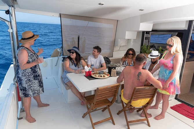 Hersonissos: Luxury Sunset Catamaran Cruise Sushi & Open Bar - Crew, music, and the small-group feel