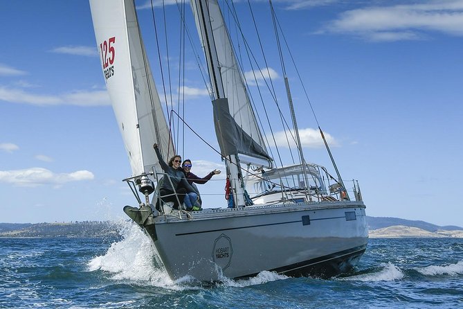Hobart Sailing Experience - Full sail and real yacht work: winches, trims, and steering time
