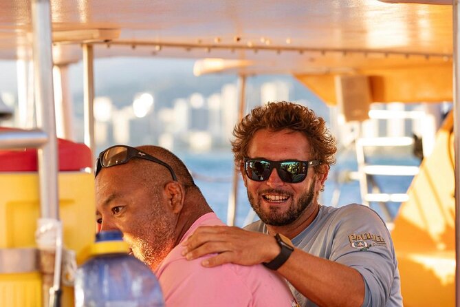 Honolulu Sunset Sail from Kewalo Harbor Including Drinks - On the Deck: Music, Crew Energy, and a Party-Friendly Atmosphere