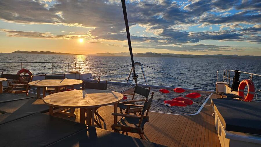 Hyères : Sunset Catamaran Cruise to Giens Peninsula - From Hyères Saint-Pierre Port to La Badine Beach at golden hour