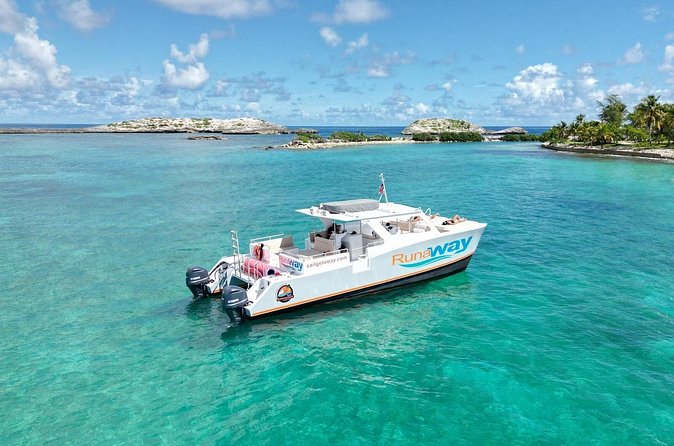 Icacos Double Dip Power Catamaran Snorkel & Beach Tour - The rum bar moment and the buffet lunch: when the day resets