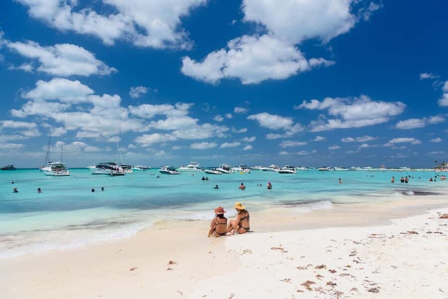 Isla Mujeres: Catamaran Ride with Open Bar, Snorkeling, and Lunch - Getting to the Boat: Pickup, Meeting Spot, and How the Day Starts