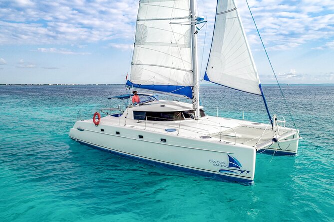 Isla Mujeres Catamaran Tour with Open Bar, Lunch and Snorkeling - Marina Sailaway departure: your first 30 minutes matter