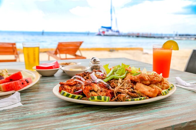 Isla Mujeres Catamaran Tour with Open Bar, Lunch and Snorkeling - Town time in Isla Mujeres: useful freedom for souvenirs and wandering