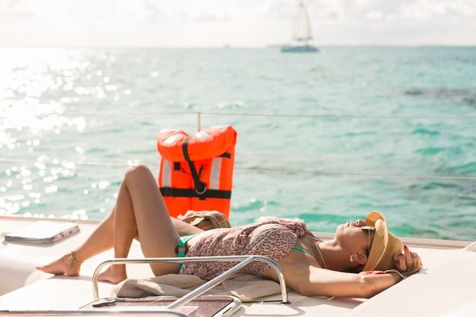 Isla Mujeres Catamaran Tour with Snorkel, Open bar and Transport - The Morning at Playa Tortugas: Check-In, Boarding, and the Docking Fee