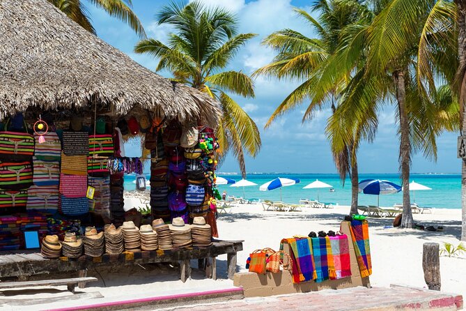Isla Mujeres Catamaran Tour with Snorkel, Open bar and Transport - Isla Mujeres Free Time: Downtown Wandering and Sunset Deck Moments