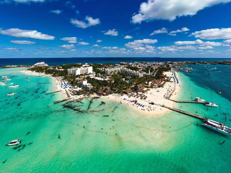 Isla Mujeres: Catamaran with Open Bar, Snorkeling and Lunch - Onboard the catamaran: music, drinks, and the party pace
