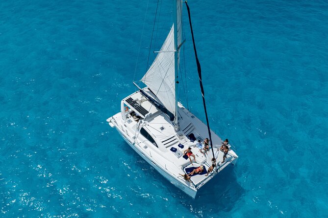 Isla Mujeres Day Tour with Catamaran, Snorkeling & Beach Club - Cancun to Isla Mujeres by catamaran: where the day starts