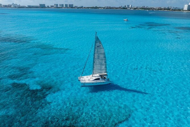 Isla Mujeres Day Tour with Catamaran, Snorkeling & Beach Club - The onboard open bar: good cheer with a safety angle