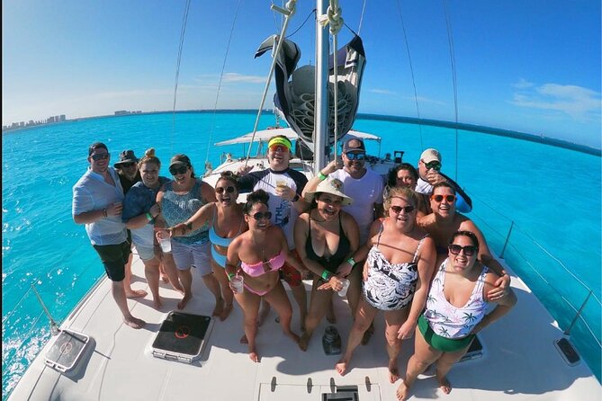 Isla Mujeres Premium Catamaran Tour with transportation from Playa del Carmen - Crew service and the language question (English offered, but not guaranteed)