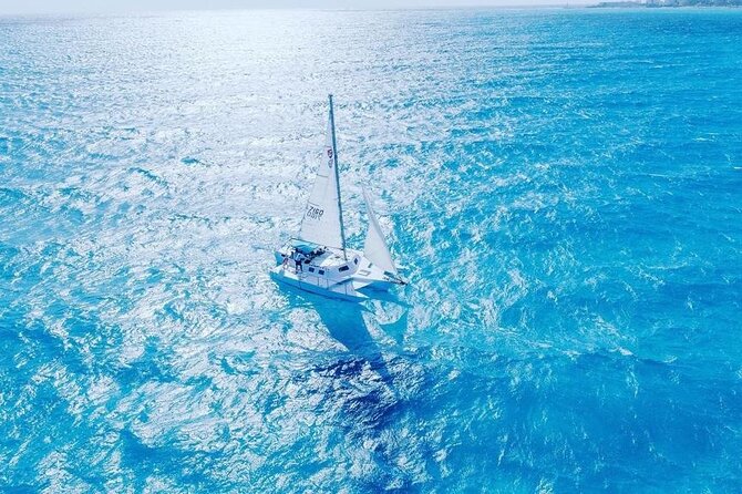 Isla Mujeres Premium Tour in Private Catamaran with Lunch - Private catamaran basics: timing, group size, and what to expect