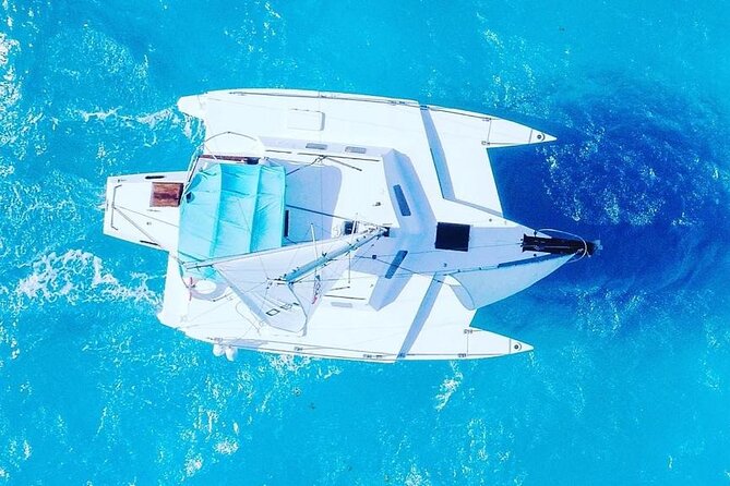 Isla Mujeres Premium Tour in Private Catamaran with Lunch - El Meco reef snorkeling: colorful fish and underwater statues in a short 45 minutes