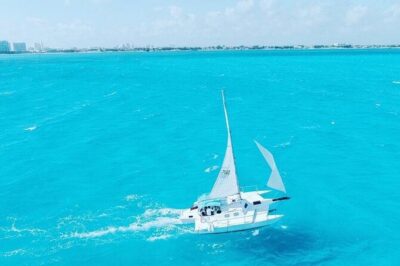 Isla Mujeres Premium Tour in Private Catamaran with Lunch - Playa Tortugas check-in, lockers, and the $25 dock tax you must budget