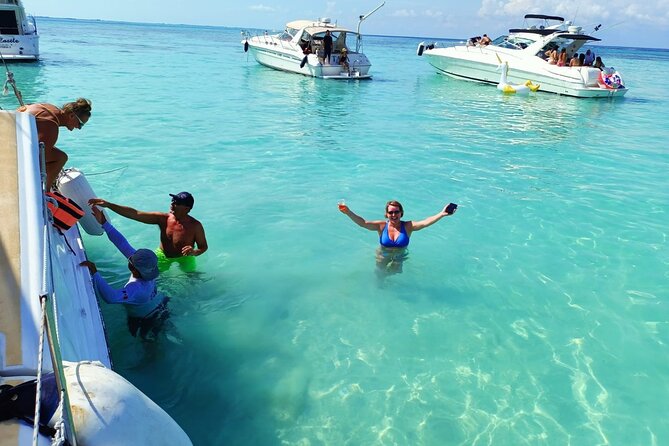 Isla Mujeres Premium Tour in Private Catamaran with Lunch - Playa Norte swim time: crystal-clear water plus a choice to explore town center