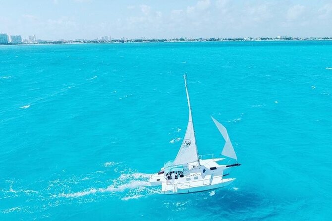 Isla Mujeres Premium Tour in Private Catamaran with Lunch - Playa Tortugas check-in, lockers, and the $25 dock tax you must budget
