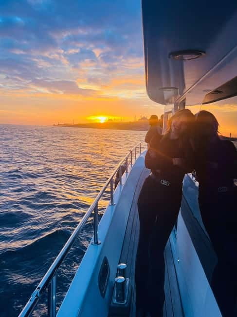 Istanbul: Bosphorus Sunset or Night Yacht Cruise & Transfers - On Board the Yacht: Snacks, Tea, Lemonade, and Live Entertainment