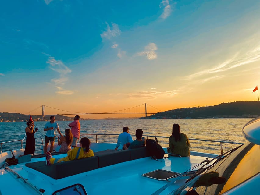 Istanbul: Bosphorus Sunset Yacht Cruise with Live Guide - Ortaköy and the Bosphorus Bridge: The Mid-Cruise Photo Moment