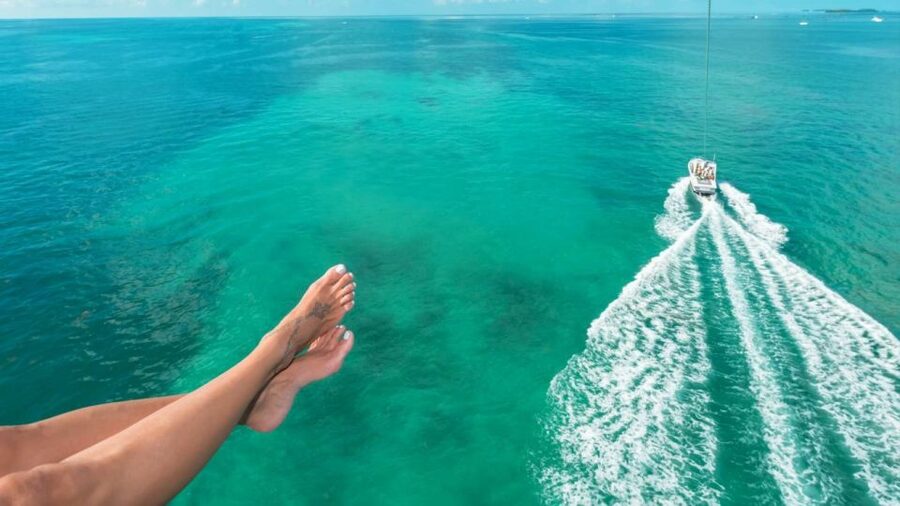 Key West: Parasailing Above the Island Paradise - Tandem vs. triple flights: matching the math to your group