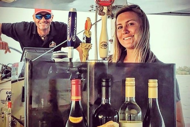 Key West Sunset Sail: Dolphin Watching, Wine, and Tapas - The Landmark Route: Mallory Square, Fort Zachary Taylor, and Sunset Key