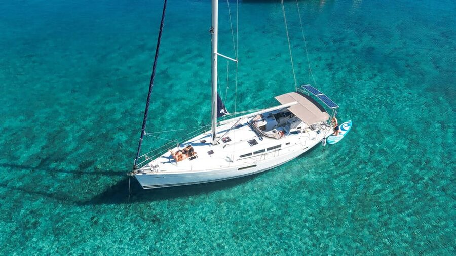 Kolimvari: Sailing Cruise with Meal & Water Activities - Agioi Theodoroi swim stop: swimming, snorkeling, and SUP time