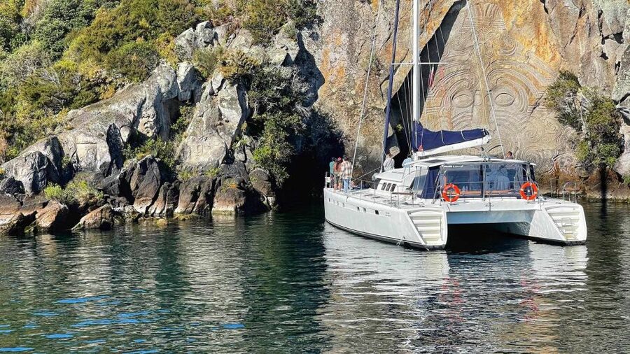 Lake Taupo: Luxury Sailing Catamaran to Māori Rock Carvings - Māori Rock Carvings: how close passes translate into better photos