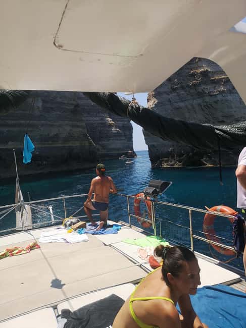 Lampedusa: Yacht excursion, swimming stops and typical lunch - East and South Coast Viewpoints: Mare Morto, Cala Creta, and Beyond