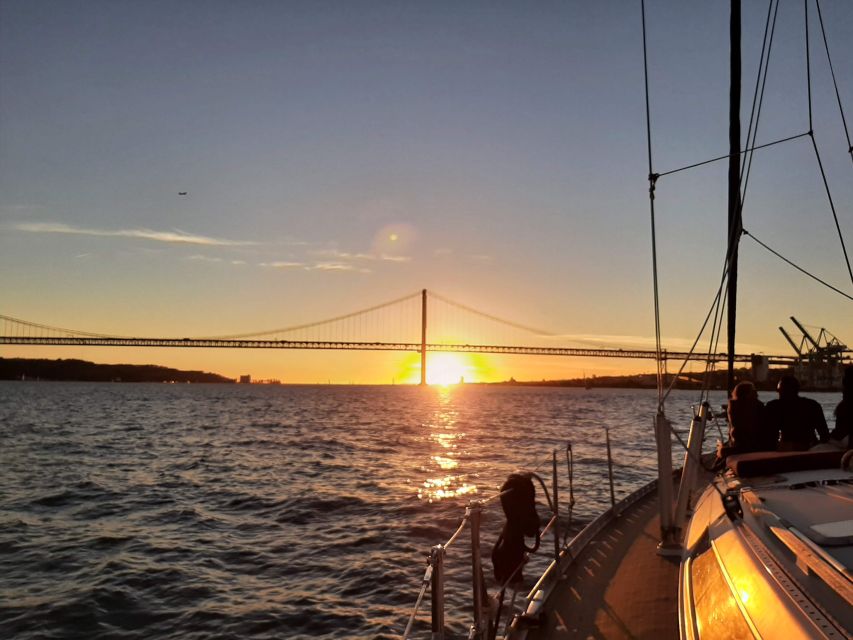 Lisbon: City Skyline Sailboat Cruise with Drink and Snacks - Santo Amaro Dock to Praça do Comércio: Starting Under the 25 de Abril Bridge