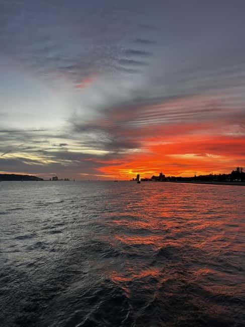 Lisbon: Sailing Boat Tour with Drinks & Pastel de Nata - Drinks and the cold-water reality: how to dress for this cruise