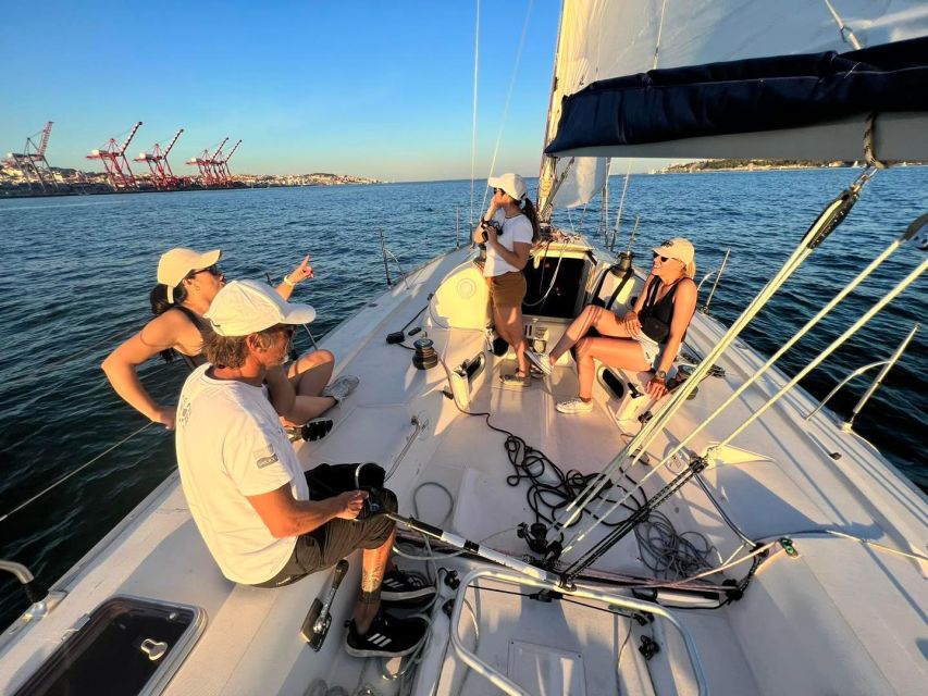Lisbon: Sailing Sunset - Commerce Square, the river core, and the 25 de Abril Bridge area