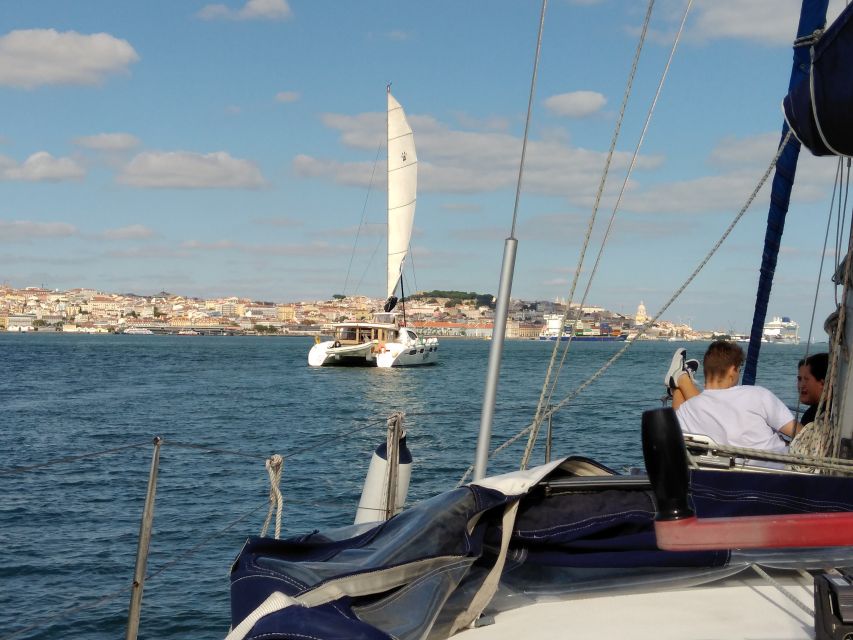 Lisbon: Sailing Tour with Wine and Snacks - Steering the boat vs. relaxing up front: choose your style