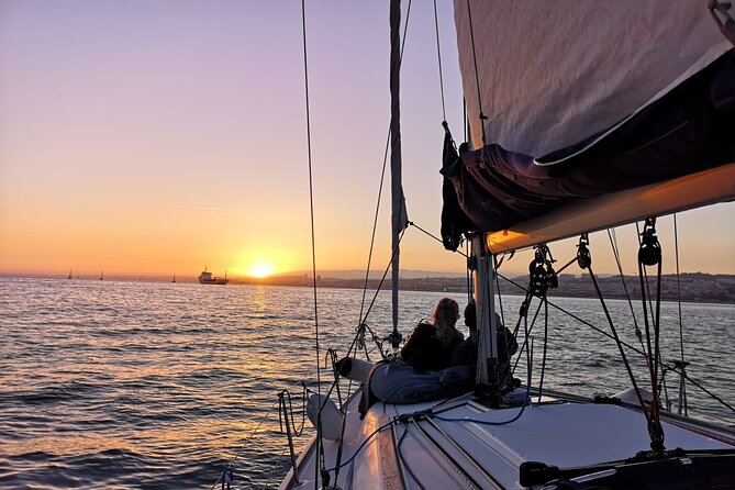 Lisbon Small Group 2h Sunset Sailing- Live Commentary & a Drink - Christ the King and the 25 de Abril Bridge: the best photo line-up for sunset