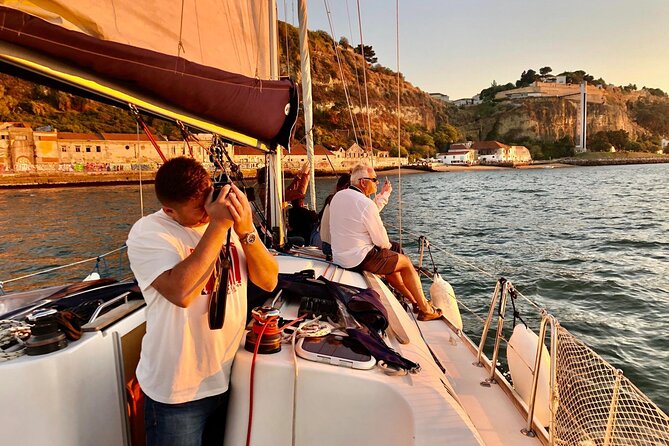 Lisbon Small Group Sunset Sailing 2h Cruise with Drinks Included - Commerce Square and Old Lisbon views: where the river meets the city center