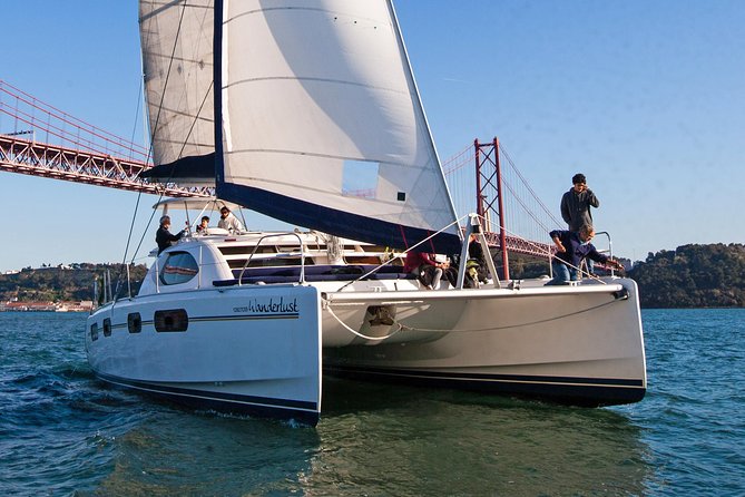 Lisbon: Sunset Cruise With Drinks on Spacious Yacht - Timing Tips: How to Dress for Windy River Air and Still Look Good