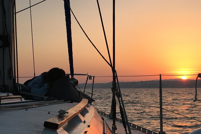 Lisbon Sunset Sailing Tour with White or Rosé Wine and Snacks - Guides, Music, and How Stories Make Lisbon Feel Bigger