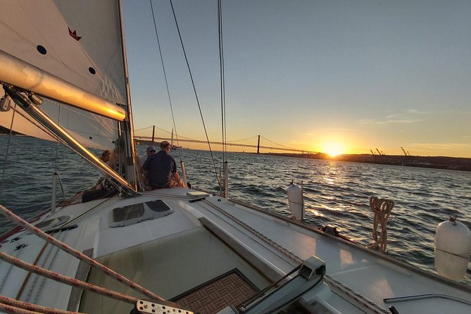 Lisbon Sunset Sailing with Portuguese Wine and History - The onboard vibe: Pedro and David-style hosting, plus the wintry reality check