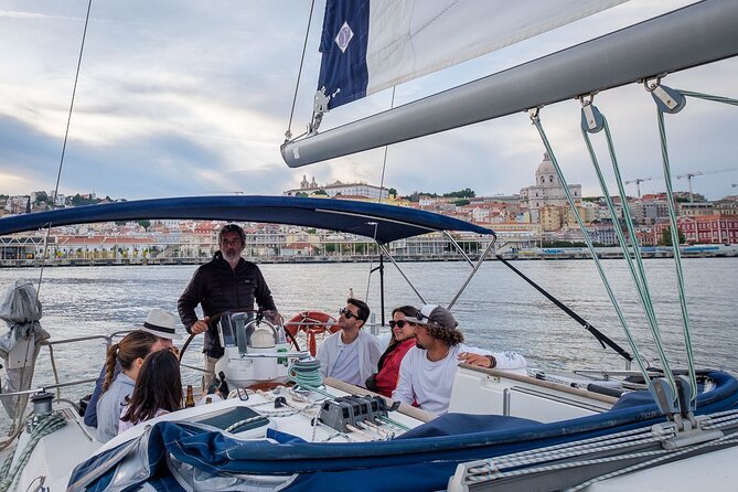 Lisbon: Sunset Tagus River Sailing Tour with Drinks - Almada views from the south shore: Cacilhas and the river’s fog history